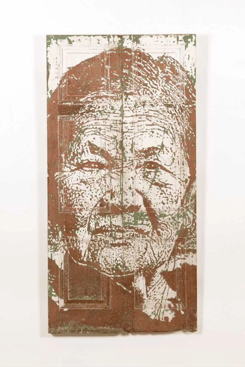 Carved wood and salvaged door works