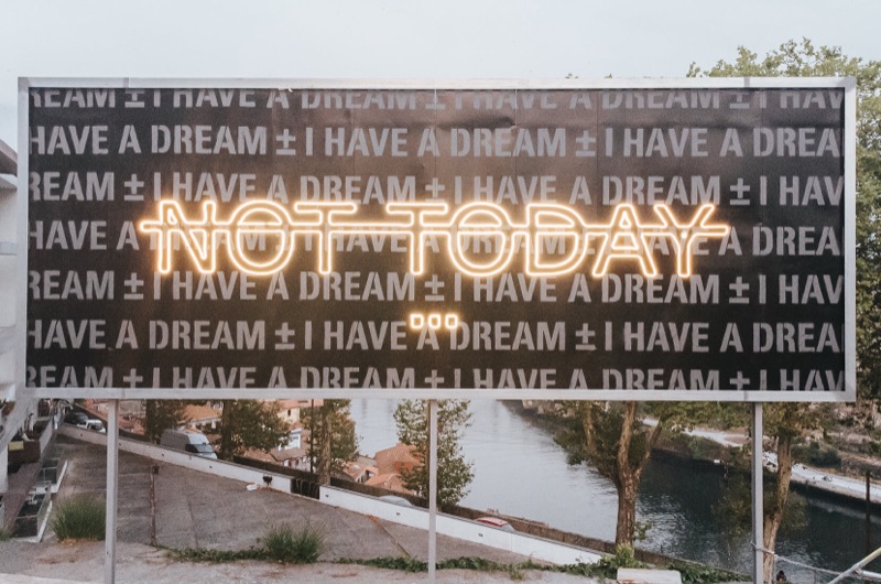 (No) Borders — ±MaisMenos± × RERO 'NOT TODAY' neon billboard