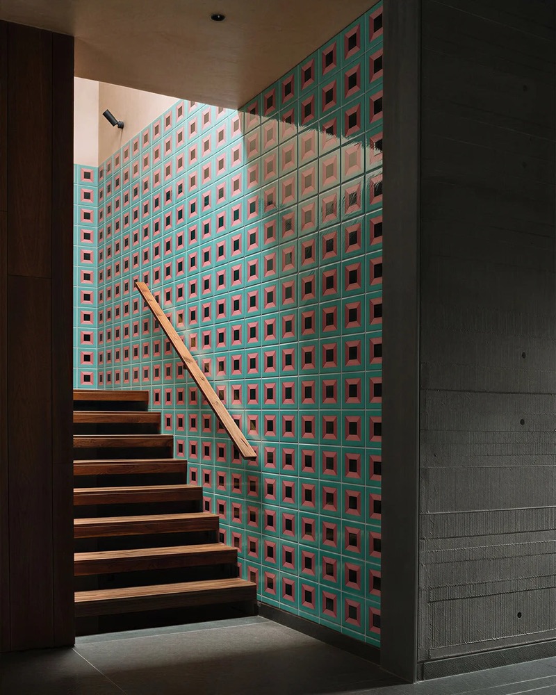 Catalogue render — BLACKDOORS Inward pattern tiles running up a staircase interior
