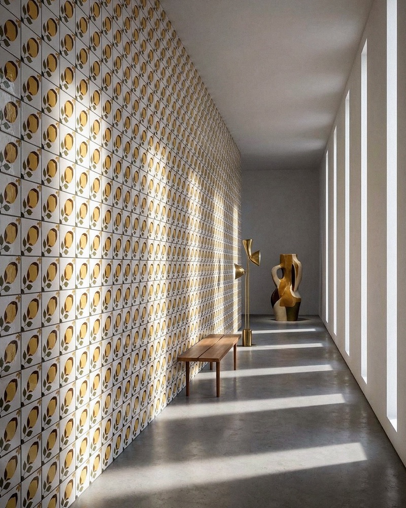 Catalogue visualisation — long gallery corridor clad floor to ceiling in a lemon-pattern tile wall, raking sunlight