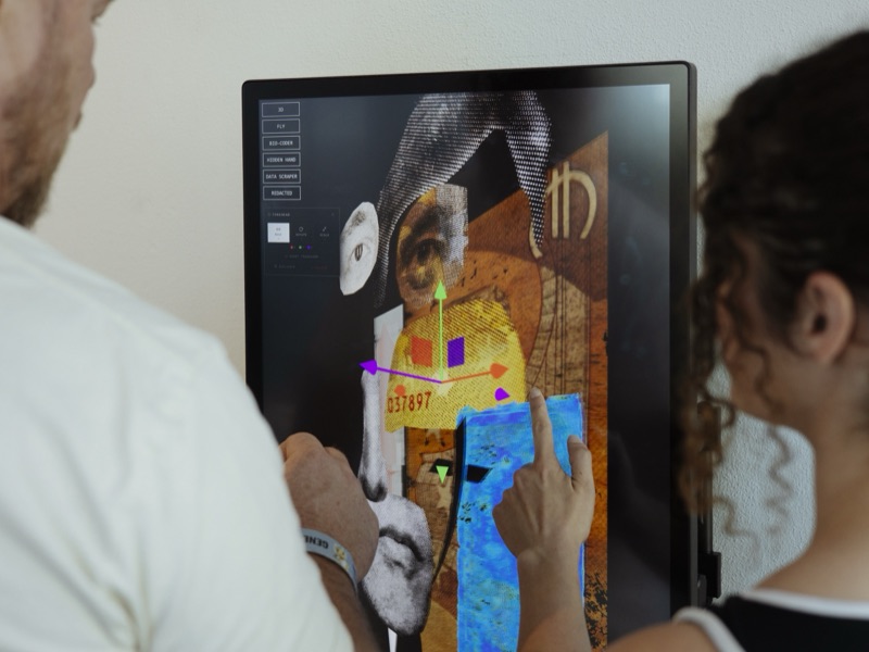 Visitors with the interactive screen work at the Unpermissioned Self opening