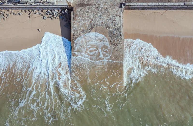 Aerial view of the José Saramago portrait carved into the Paimogo breakwater