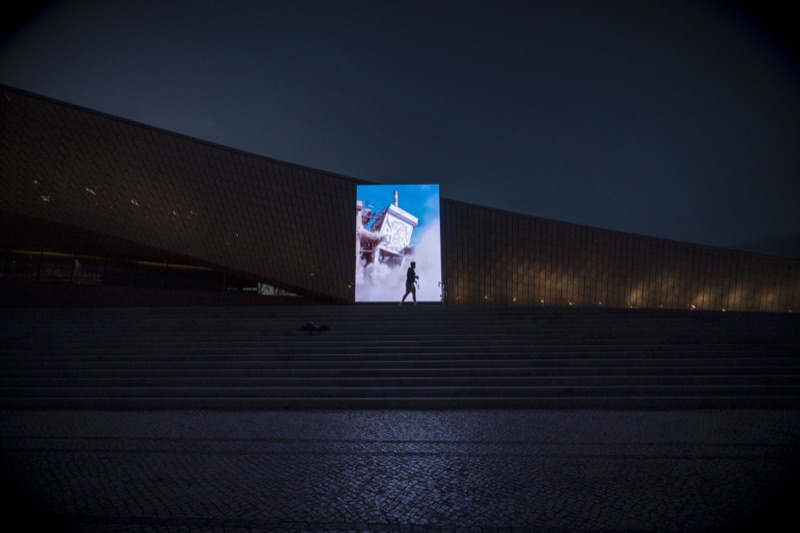 The MAAT facade screen at dusk during Prisma