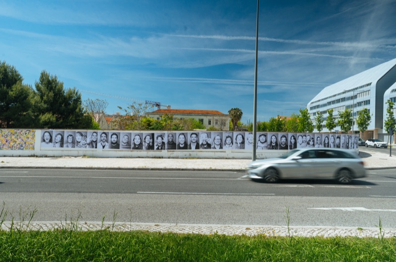 JR Inside Out Project, wall of community portraits, Lisbon, 2025