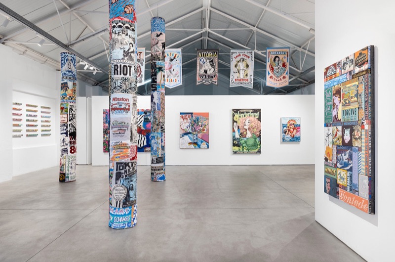 FAILE banners hanging over paintings, installation view, Underdogs Gallery, 2026