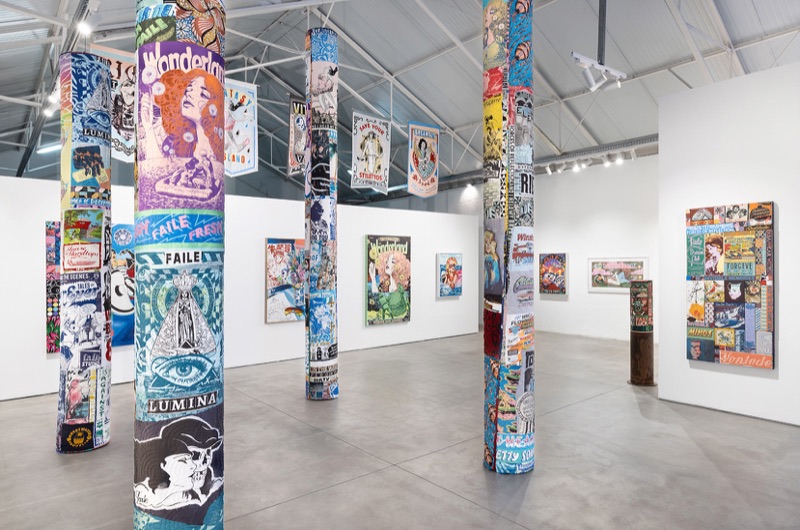 FAILE — Something to Believe In, quilted columns, hanging banners and wall works in one dense view, Underdogs Gallery, 2026