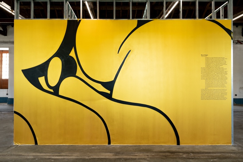 Nuno Viegas yellow glove mural, final install, Cordoaria Nacional, 2023