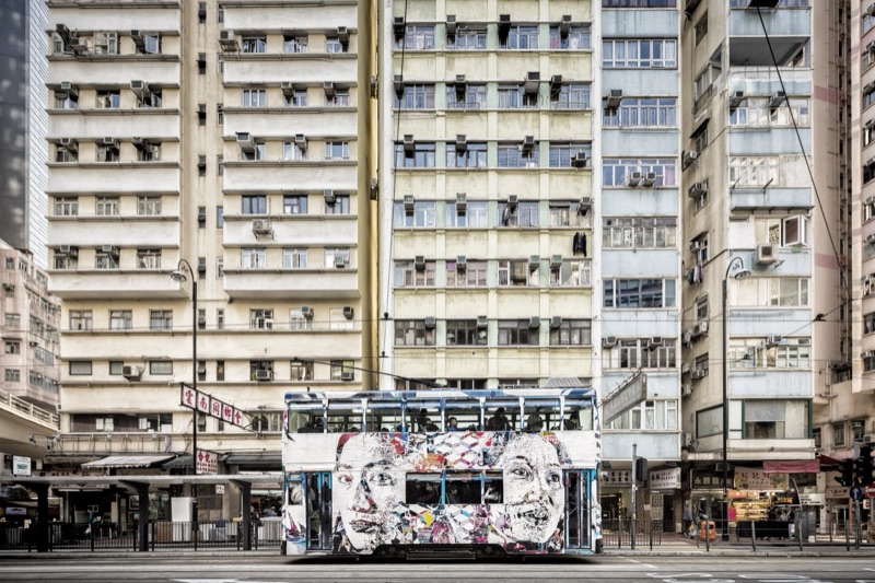 The Vhils-carved tram in circulation, Debris season, Hong Kong, 2016